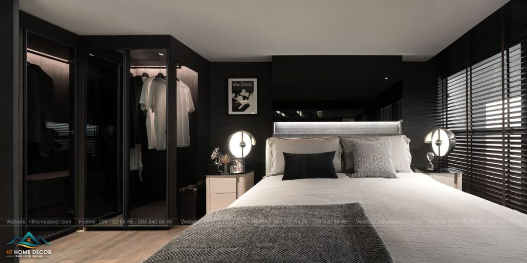  Không gian phòng ngủ của căn hộ cá tính thứ nhất. Vẫn là sự đan xen của những tone màu cơ bản đen trắng và xám.