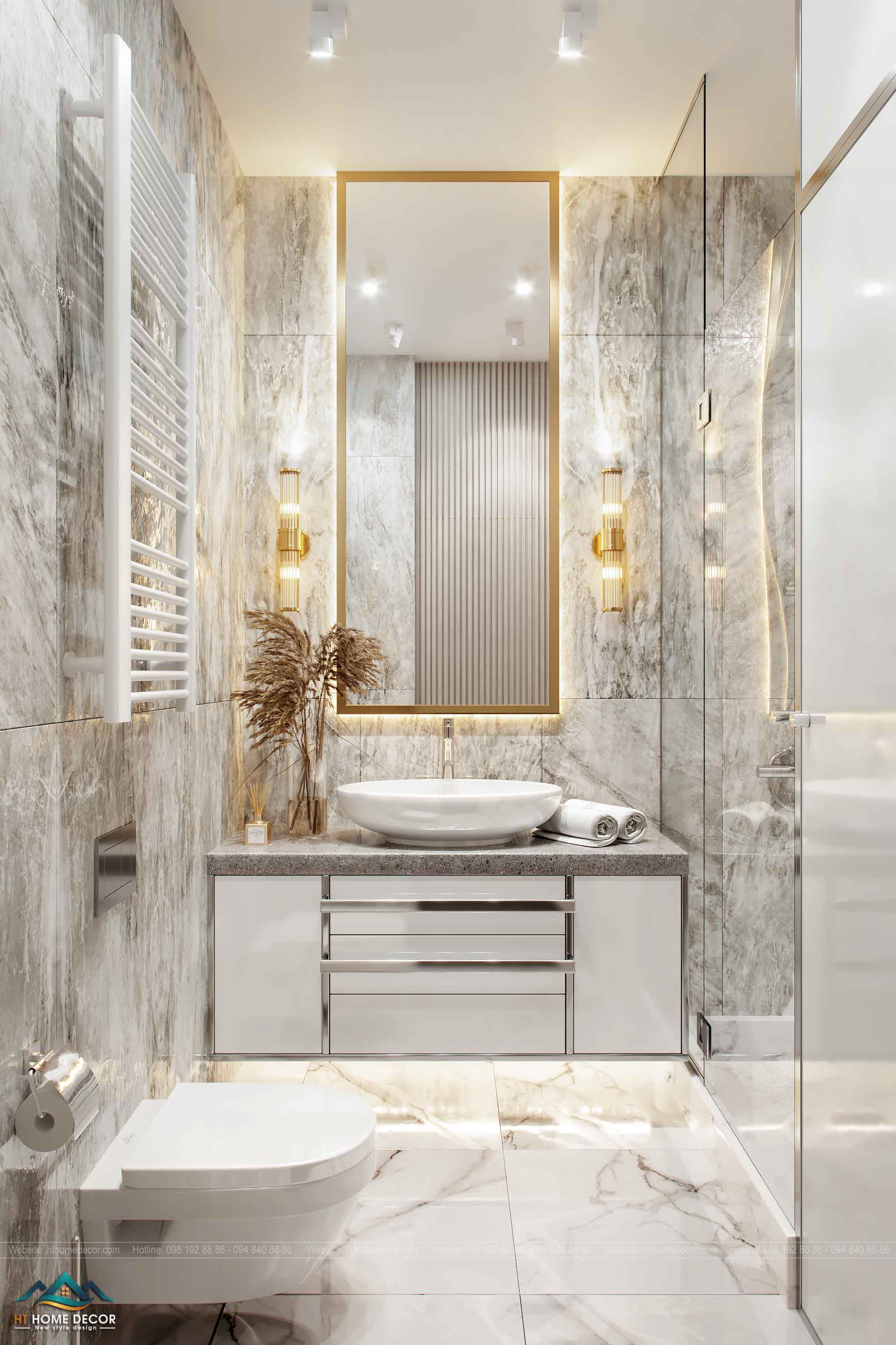 Lavabo hiện đại và đơn giản. Phía dưới có một tủ đa chức năng. Phòng tắm có gương lớn được đóng khung bằng đồng rất đẹp. Lót sàn và ốp tường bằng gạch sứ màu sáng và xám làm cho ánh sáng bên trong được tăng thêm.