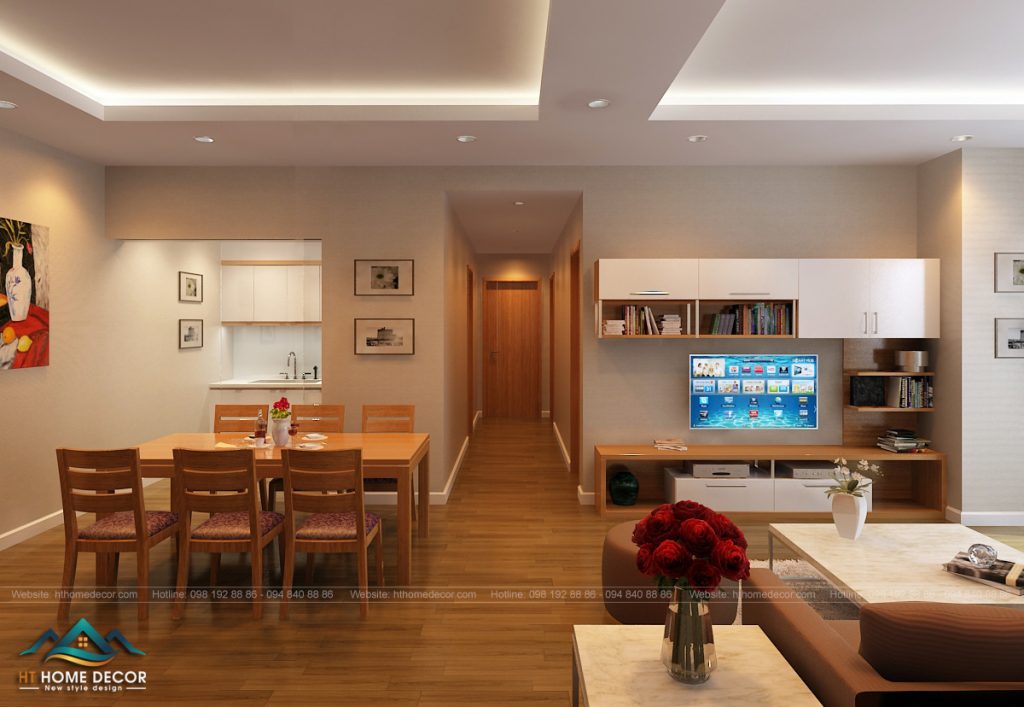 Sự hòa hợp hoàn hảo giữa gam màu nâu gỗ và màu trắng. Khu vực bếp nhỏ gọn, không làm cho không gian ngột ngạt bởi sự liên thông giữa phòng khách và bếp.